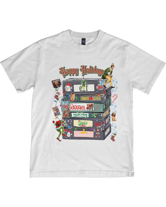 Retro Christmas Shirt | Happy Holidays VHS Tape Stack | Classic Movie Tee | Christmas Decor Shirt | Vintage Film Lover Gift